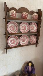 Wand met borden en vazen, Ophalen