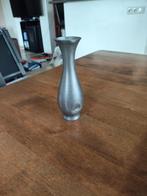 Knopvaas Tin, Ophalen