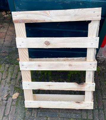 Houten pallet gratis beschikbaar voor biedingen