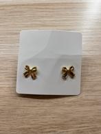 Gouden strikjes oorbellen, Ophalen of Verzenden, Zo goed als nieuw, Knopjes of Stekers, Goud