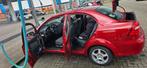 Chevrolet Aveo 1.4 16V 4D 2009 Rood, Auto's, Voorwielaandrijving, 15 km/l, Aveo, 4 cilinders