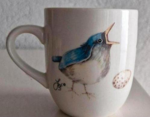 Beker Jet Vogel Spring, Huis en Inrichting, Keuken | Servies, Zo goed als nieuw, Kop(pen) en/of Schotel(s), Overige stijlen, Ophalen of Verzenden