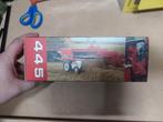 International 445 balenpers minitrac, Hobby en Vrije tijd, Modelauto's | 1:32, Ophalen of Verzenden, Nieuw, Tractor of Landbouw