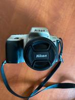 Nikon F50 analoog camera plus handleiding, Spiegelreflex, Gebruikt, Ophalen of Verzenden, Nikon