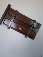 valet-style broekenpers, Ophalen