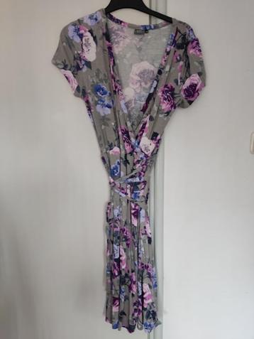 Liv taupe kleurige dames jurk met bloemen print motieven beschikbaar voor biedingen