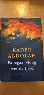 Kader Abdolah - Papegaai vloog over de IJssel, Gelezen, Ophalen of Verzenden, Nederland, Kader Abdolah