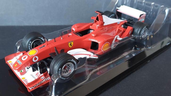 Ferrari F2002 Michael Schumacher 2002 1:24 Ixo Premium Pol, Hobby en Vrije tijd, Modelauto's | 1:24, Verzenden