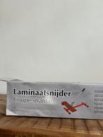 Laminaat snijder, Ophalen