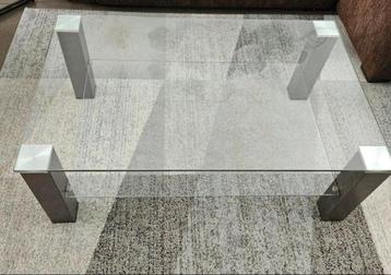 Glazen salontafel met zware vierkante poten beschikbaar voor biedingen