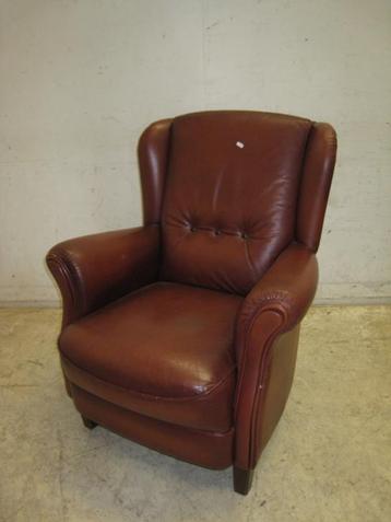 Klassieke rundleren fauteuil beschikbaar voor biedingen