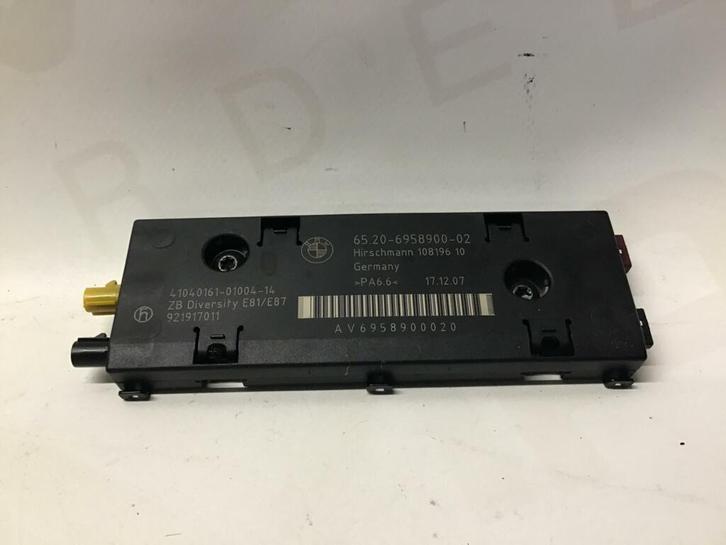 Antenne versterker BMW 1-serie E87 ('07-'11) 6520695890002, Auto diversen, Autoradio's, Ophalen of Verzenden