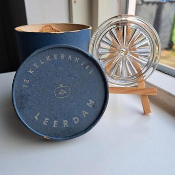 12 vintage kelkebakjes/ onderzetters van Leerdam beschikbaar voor biedingen