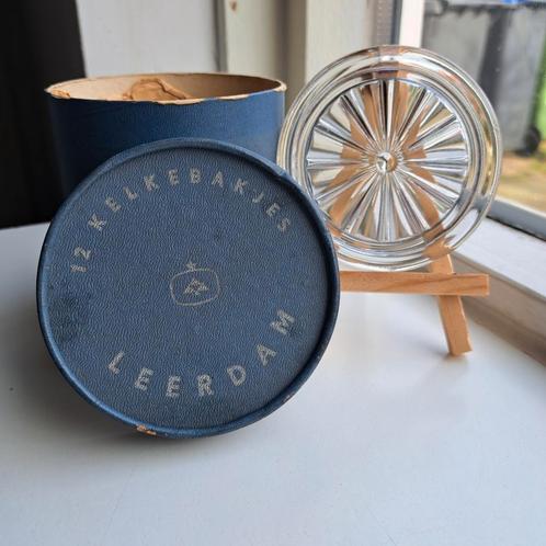 12 vintage kelkebakjes/ onderzetters van Leerdam, Huis en Inrichting, Woonaccessoires | Onderzetters, Zo goed als nieuw, Glas of Kopje