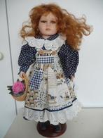 Porseleinen pop met mandje., Ophalen of Verzenden, Zo goed als nieuw, Pop