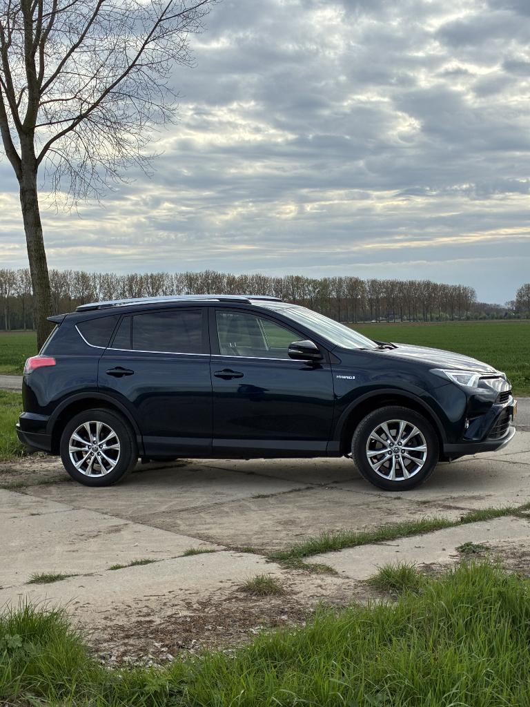 Toyota Rav4 2.5HYBRID AWD Exec.Bns. 2016 Blauw Leder Trekh, Auto's, Toyota, Automaat, Blauw, 1650 kg, Leder
