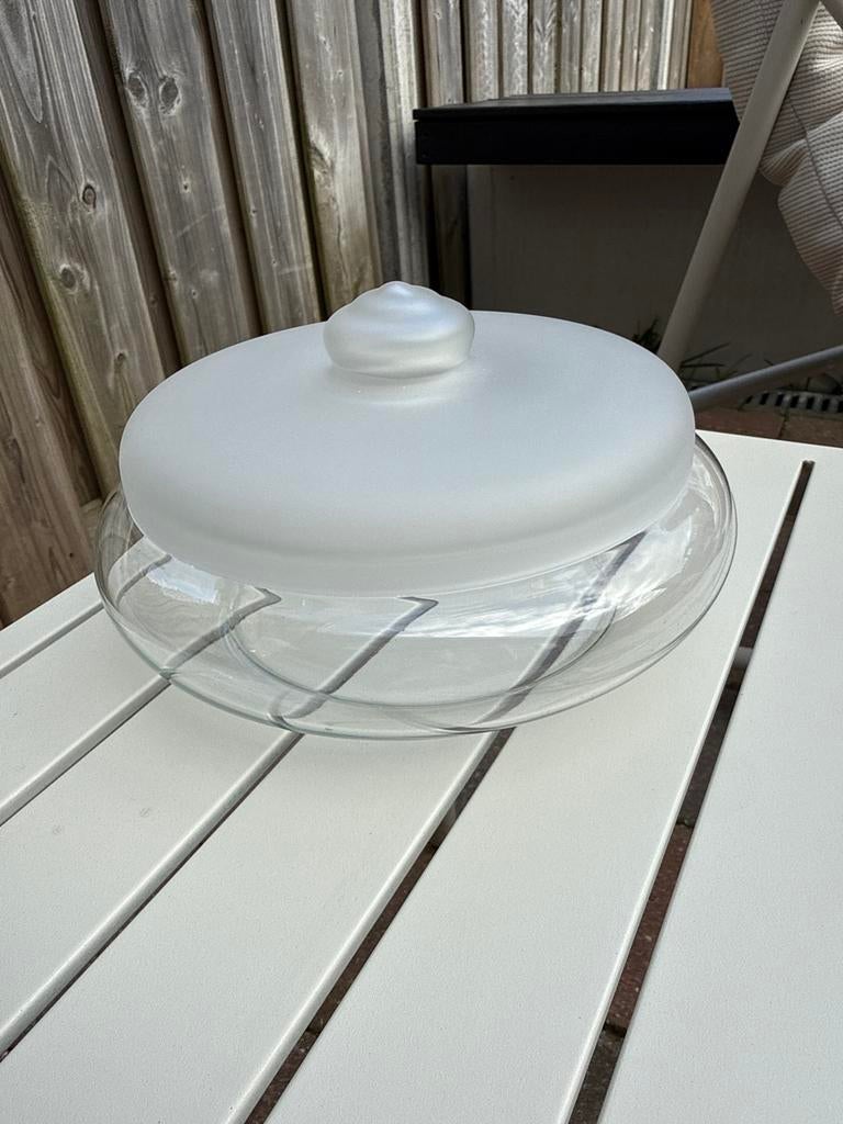 Antieke koekpot van glas, Ophalen