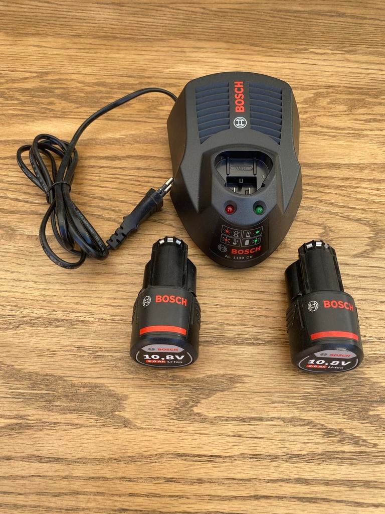 Bosch Oplader AL 1130 CV met 2x 10,8V 2.0Ah Accu's, Ophalen of Verzenden, Gebruikt