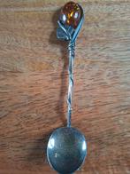 925 zilveren lepeltje met barnsteen, Ophalen