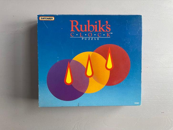 Rubik's Clock Puzzle (in originele verpakking), Hobby en Vrije tijd, Gezelschapsspellen | Overige, Zo goed als nieuw, Een of twee spelers