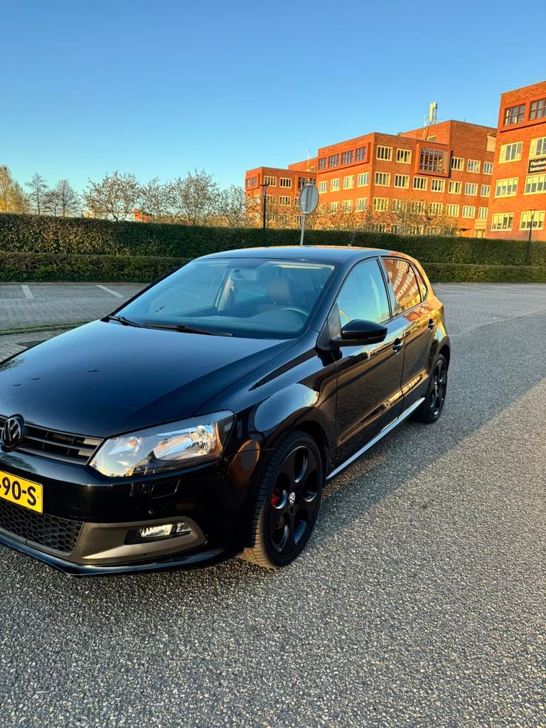Volkswagen Polo 1.4 16V FSI 63KW 2009 Zwart, Auto's, Voorwielaandrijving, 970 kg, Stof, Zwart