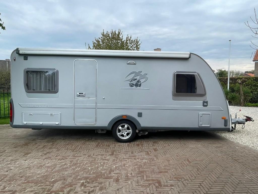 Knaus Eurostar 550 FU, topstaat, airco, mover, luifel, luxe!, Schokbreker, Rondzit, Particulier, Vast bed