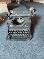 Typemachine  olivetti, Ophalen