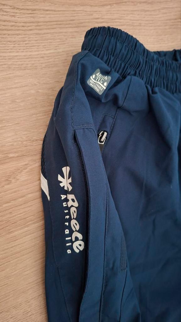 Reece ademende regenbroek maat 164 - Ideaal voor sport, Caravans en Kamperen, Regenkleding, Gebruikt, Regenlaarzen, Kinderen, Ophalen of Verzenden