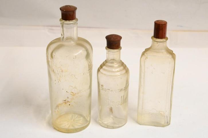 Dralle en Alpecin haarwater flessen jaren 30 begin 40, Verzamelen, Merken en Reclamevoorwerpen, Gebruikt, Verpakking, Ophalen of Verzenden