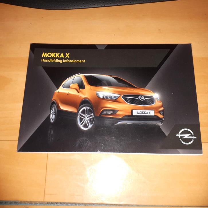 Mokka infotainment Navi 900 Intellilink  instructieboekje., Auto diversen, Handleidingen en Instructieboekjes, Verzenden
