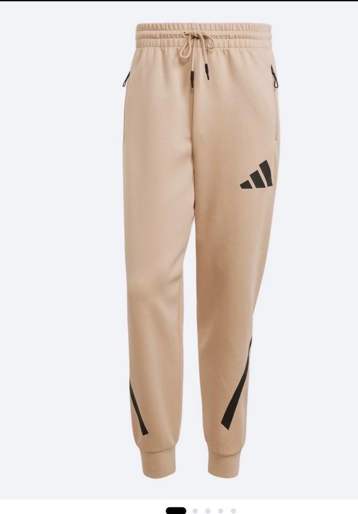 Adidas joggingbroek dames - beige new collection pants -xS, Kleding | Dames, Broeken en Pantalons, Nieuw, Maat 34 (XS) of kleiner