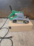Hitachi SB-110 bandschuurmachine, Doe-het-zelf en Verbouw, Gereedschap | Schuurmachines, Ophalen of Verzenden, Gebruikt, Bandschuurmachine