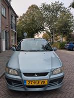 Mitsubishi Space Star 1.8 MPI Comfort 2005 Grijs, Auto's, 1200 kg, 1834 cc, 8200 pk, Leder en Stof