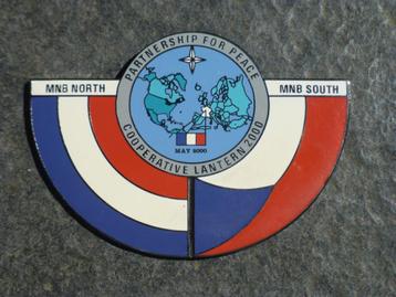 Metalen badge van Coola-2000 beschikbaar voor biedingen