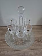 Kristallen karaf set, Ophalen