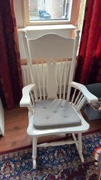 Witte schommelstoel, Ophalen