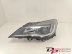 Koplamp links van een Opel Astra