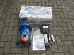 oude kyosho buggy met doos en boekje, Elektro, Gebruikt, Auto offroad, Ophalen of Verzenden