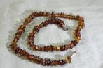 Split halsketting met amber steen, Sieraden, Tassen en Uiterlijk, Kettingen, Met edelsteen, Gebruikt, Ophalen of Verzenden, Bruin