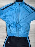 Blauw Heren Trainingspak met Zwarte Streep - Maat M, Kleding | Heren, Sportkleding, Verzenden, Gedragen, Maat 48/50 (M), Blauw