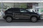 Toyota Yaris Cross 1.5 Hybrid First Edition, Stof, Gebruikt, 116 pk, Zwart