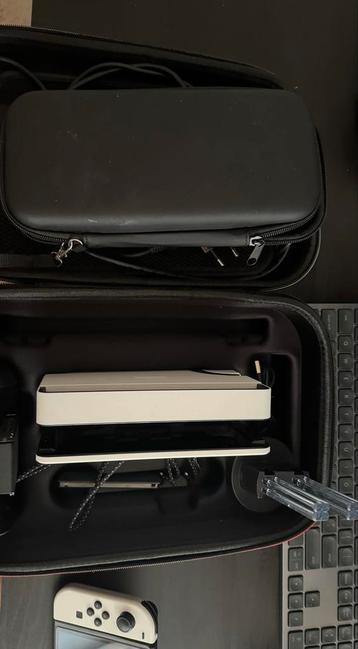 Nintendo Switch OLED + Veel Accessoires (COMPLEET) beschikbaar voor biedingen