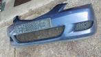 Blauwe voorbumper Mazda 323 uit 2004, Ophalen of Verzenden