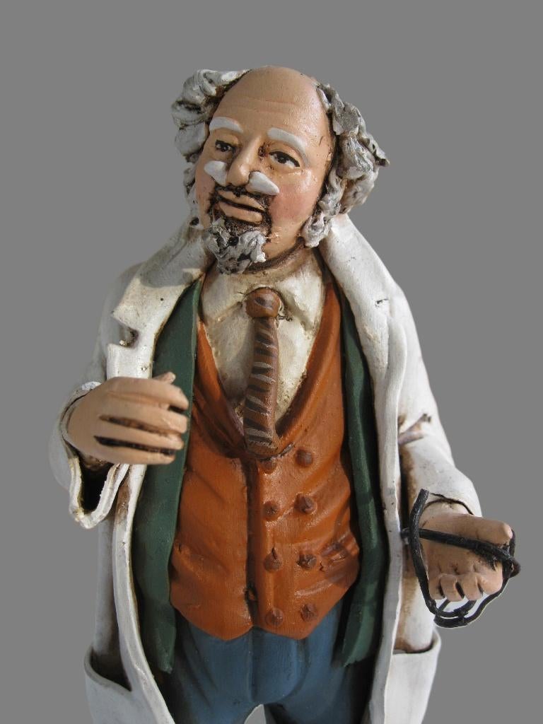 Beeld dokter in keramiek., Ophalen