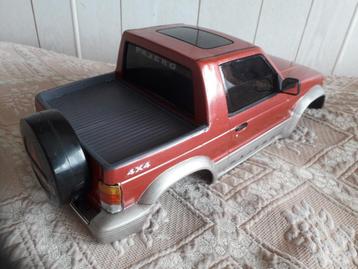 LEUKE VERBOUWDE TAMIYA MITSUBISHI PAJERO BODY TOT PICK UP beschikbaar voor biedingen