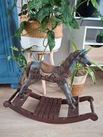 Antiek houten paard, Ophalen