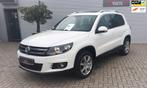 Volkswagen Tiguan 1.4 TSI Sport&Style panoramadak, navigatie, Voorwielaandrijving, 15 km/l, Gebruikt, Zwart