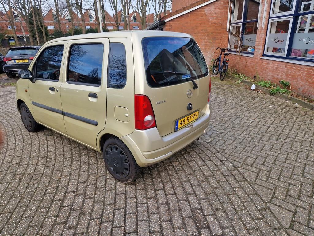 Opel Agila 1.0 2005, Auto's, Voorwielaandrijving, Stof, Overige kleuren, Origineel Nederlands