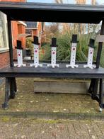 Houten sneeuwpoppen, Ophalen