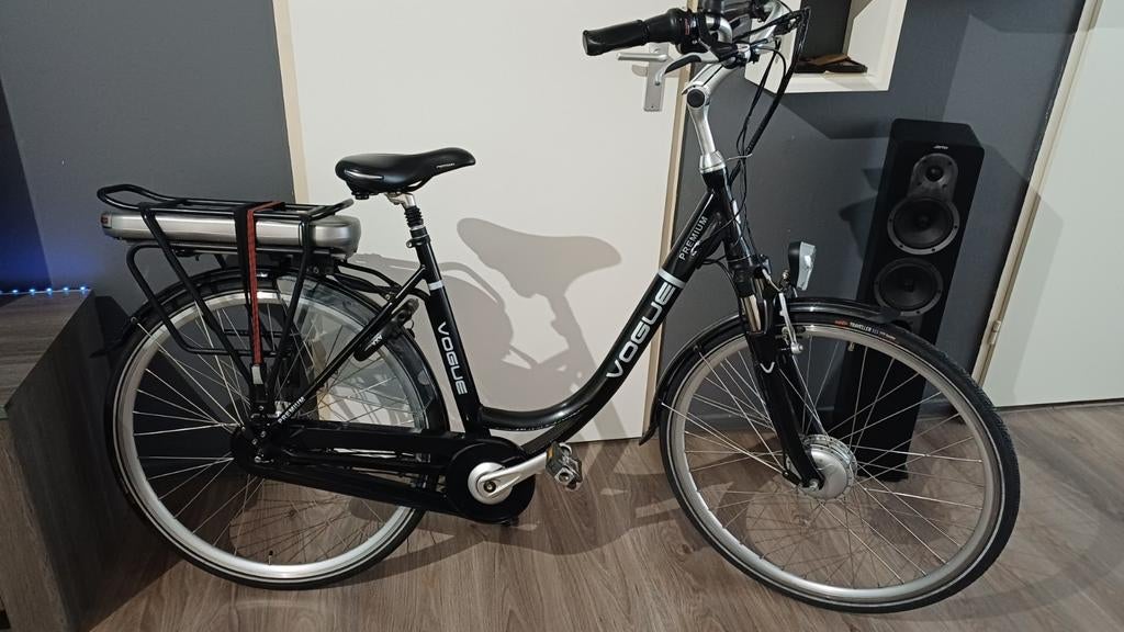 VOGUE Primium N7 Elektrische Fiets 28" D52. 7 vers, Zo goed als nieuw, 51 tot 55 cm, 50 km per accu of meer, Ophalen